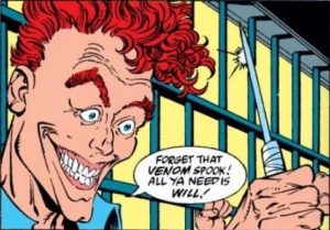 Cletus Kasady, as he first appears in Spider-Man comic books. He is in front of prison bars and has bright red hair. The frame is a close-up of his face. Cletus gleefully, psychotically stares at a prison shiv he made. His speech bubble says "Forget about that Venom spook. All ya need is will!"