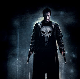 A cropped poster for The Punisher. He is wearing a trenchcoat, his famous skull logo shirt, and has a handgun in each had.