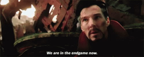 Dr. Strange, as played by Benedict Cumberbatch, says "We are in the endgame now." It is one of the last scenes from Avengers: Infinity War (2018). He is injured and appears somber.