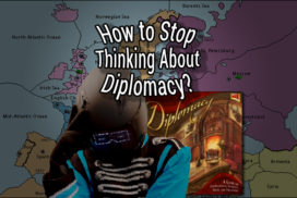 BroBot rubs his head in thought in front of a Diplomacy box and game board